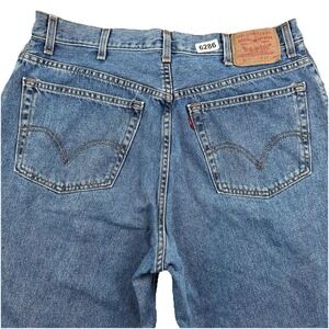 VTG Y2k Levi's 560 Loose Comfort Fit Jeans Fits 36x34 Tapered Denim Light Blue